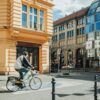 architect riding bicycle city
