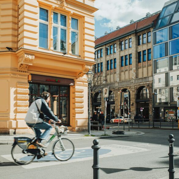 architect riding bicycle city