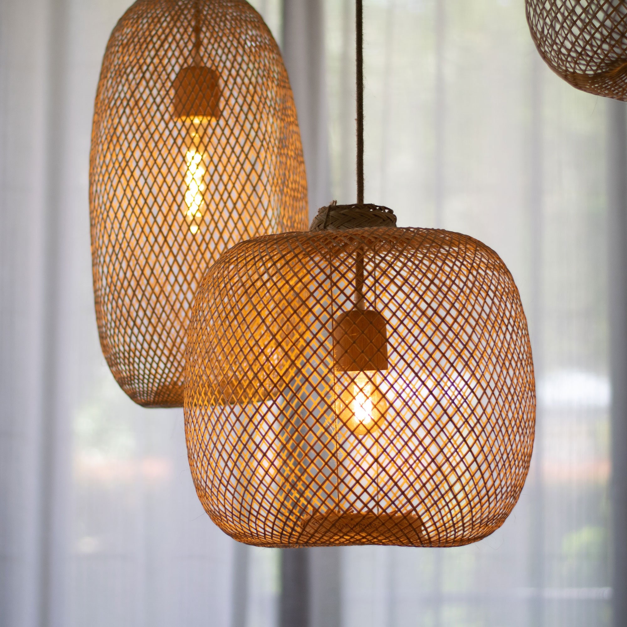Architectural bamboo pendant lamp casting geometric shadows