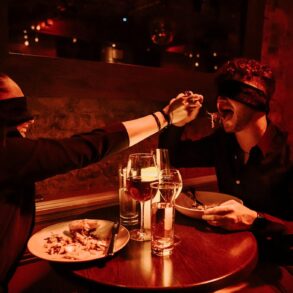 candlelit dinner dark restaurant