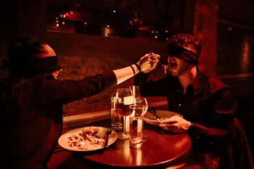 candlelit dinner dark restaurant