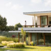 discreet modern architecture blending into natural landscape