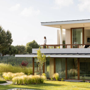 discreet modern architecture blending into natural landscape