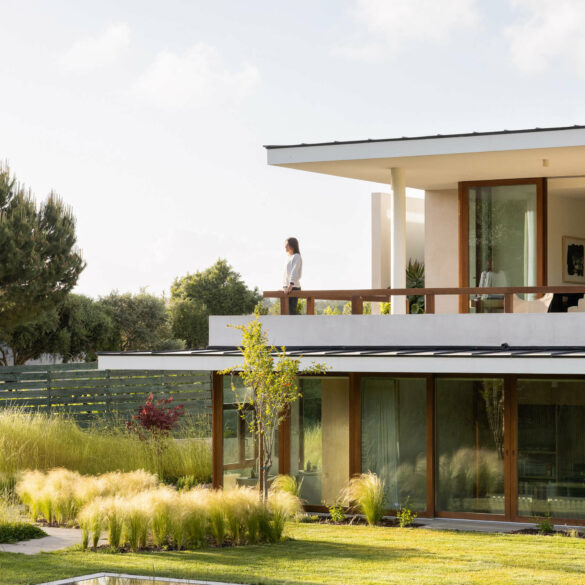 discreet modern architecture blending into natural landscape