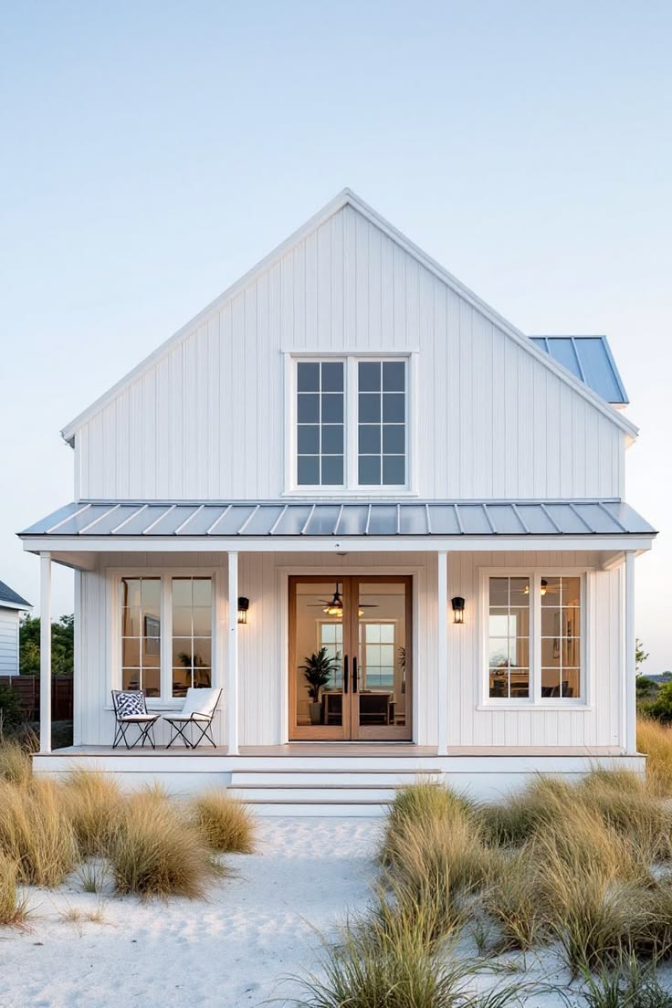 California beach house exterior with white shingle siding