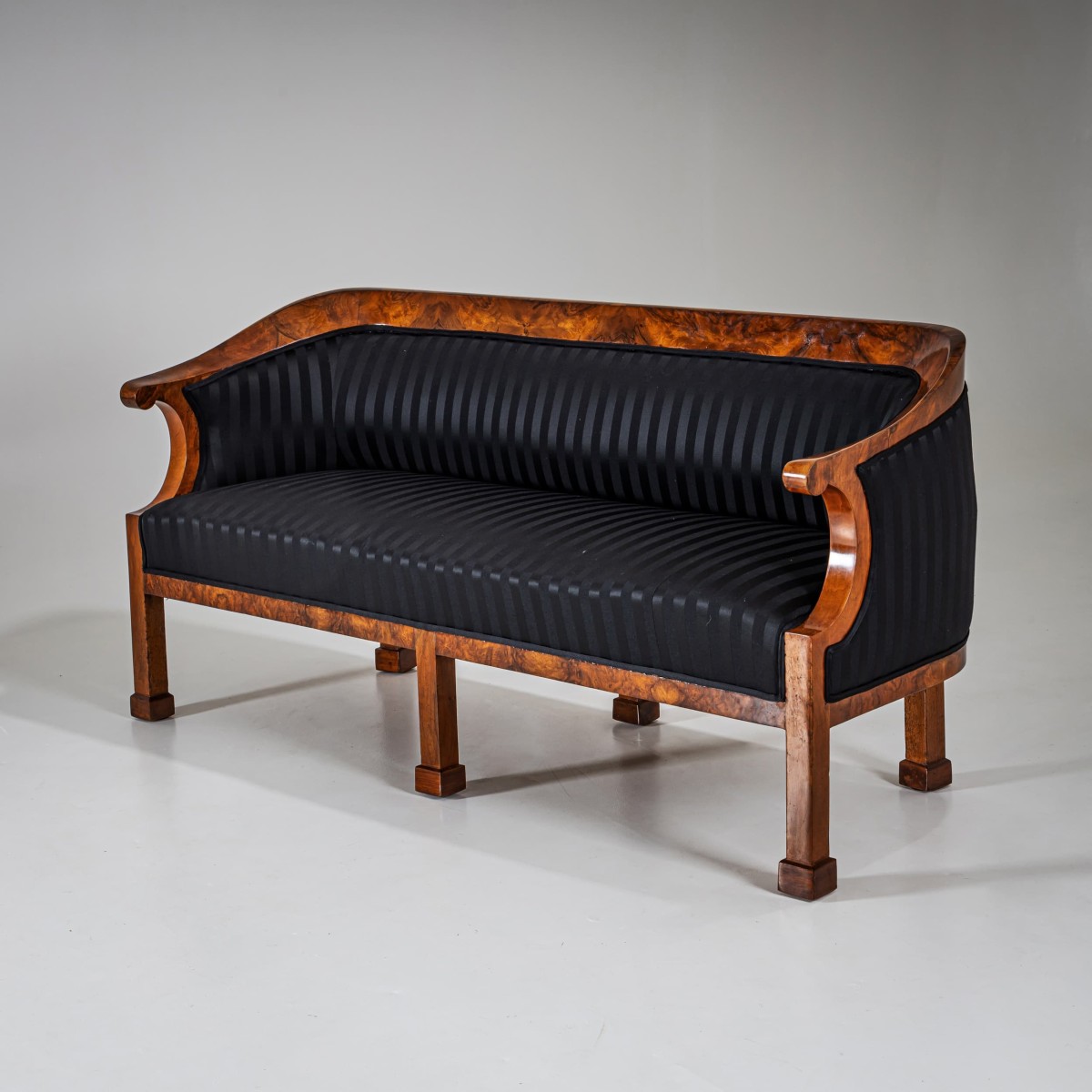 curved walnut Biedermeier sofa with striped fabric