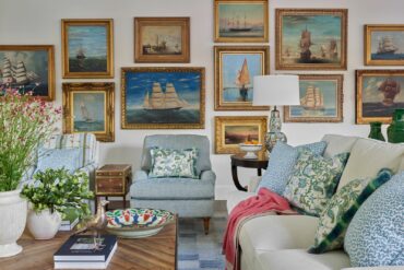 framed art gallery wall above walnut sideboard