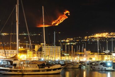 Mount Etna eruption sailboat
