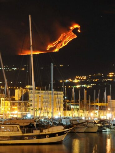 Mount Etna eruption sailboat