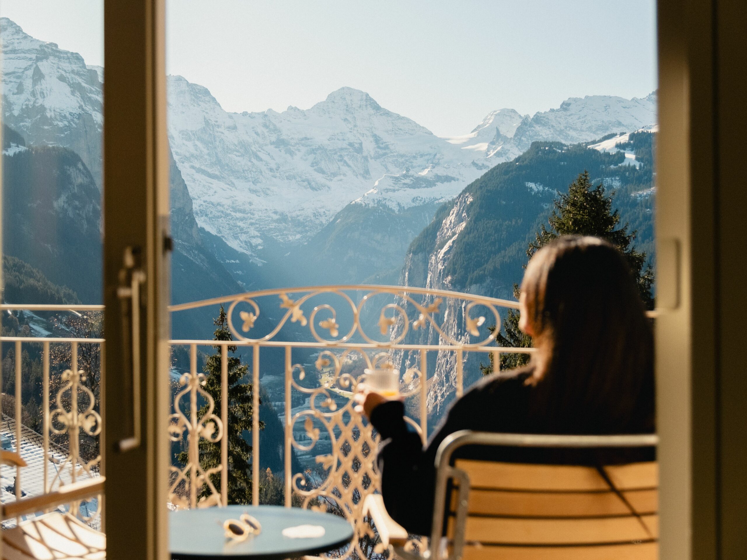 outdoor stone fireplace on private terrace of Swiss