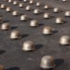 Ai Weiwei cast iron helmets