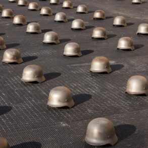 Ai Weiwei cast iron helmets