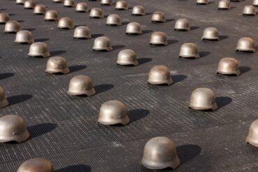Ai Weiwei cast iron helmets
