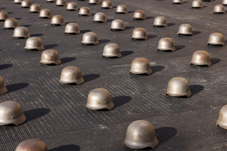 Ai Weiwei cast iron helmets