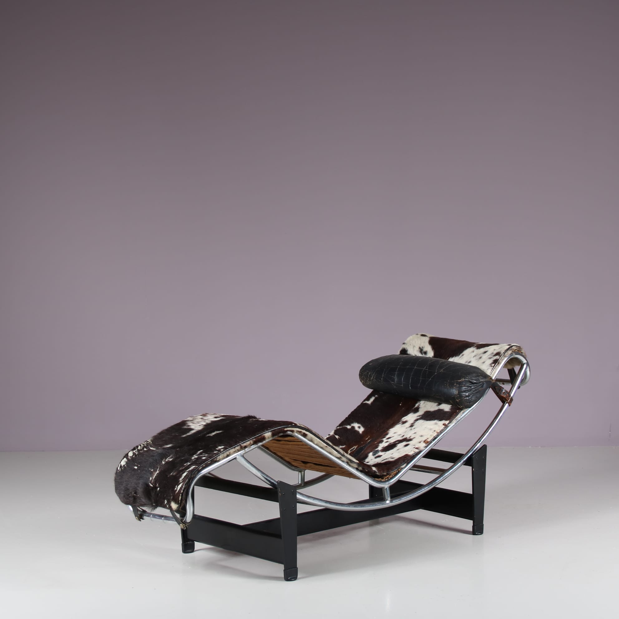 Charlotte Perriand LC4 tubular steel and cowhide chaise
