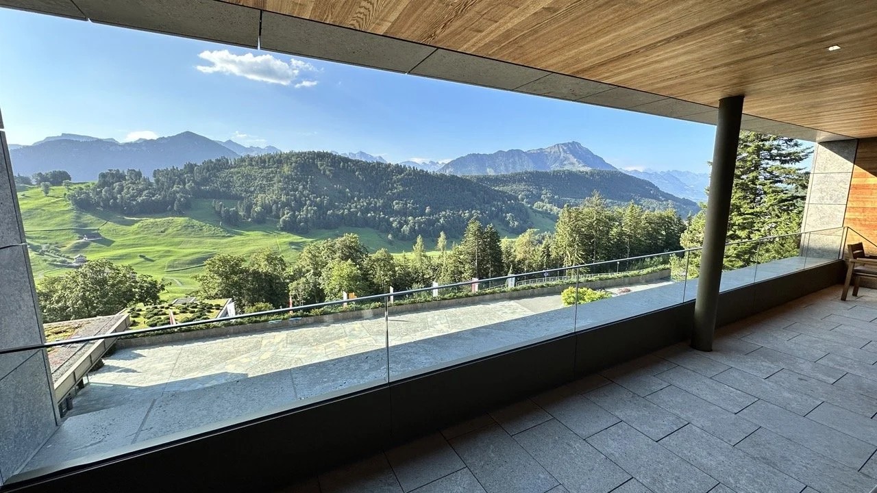 modern swiss medical spa room mountain view